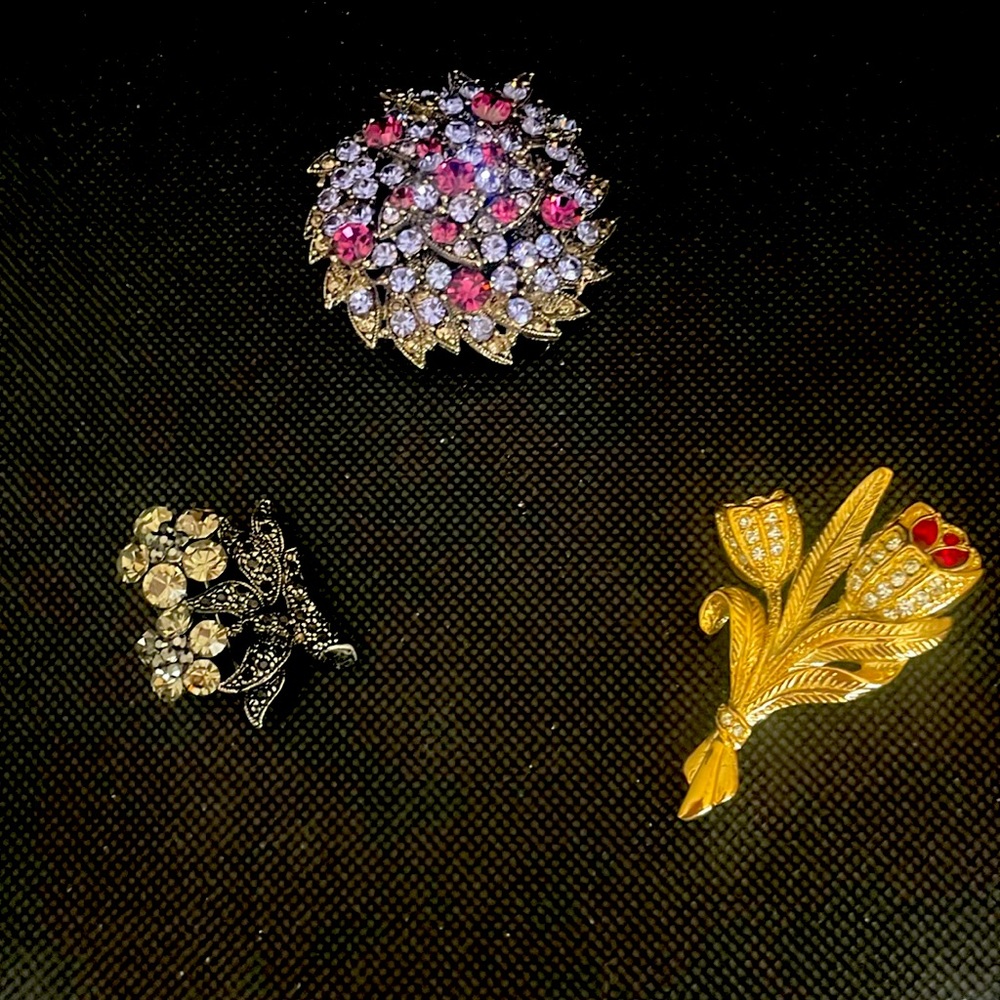 Add sparkle to any outfit with these three beautiful brooches.